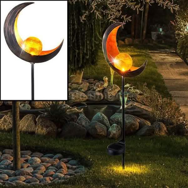 Solar LED Simulate Flame Light Lawn Lantern Lamp Waterproof Outdoor Lights type C, shown in use with a backyard as background