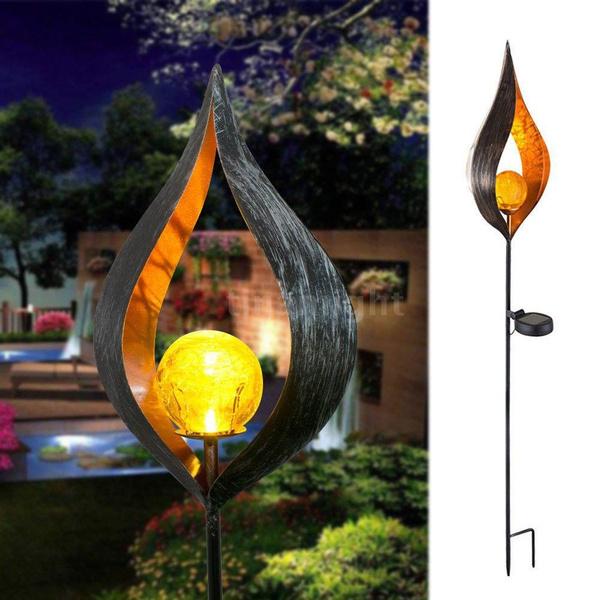 Solar LED Simulate Flame Light Lawn Lantern Lamp Waterproof Outdoor Lights type D, shown in use with a backyard as background