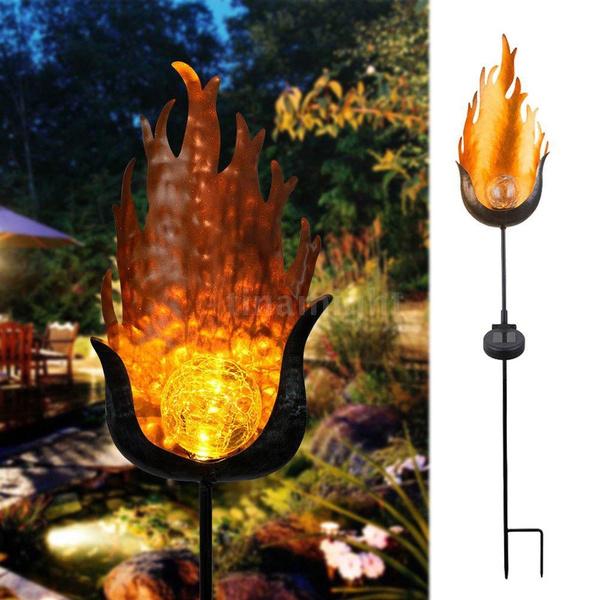 Solar LED Simulate Flame Light Lawn Lantern Lamp Waterproof Outdoor Lights type E, shown in use with a backyard as background