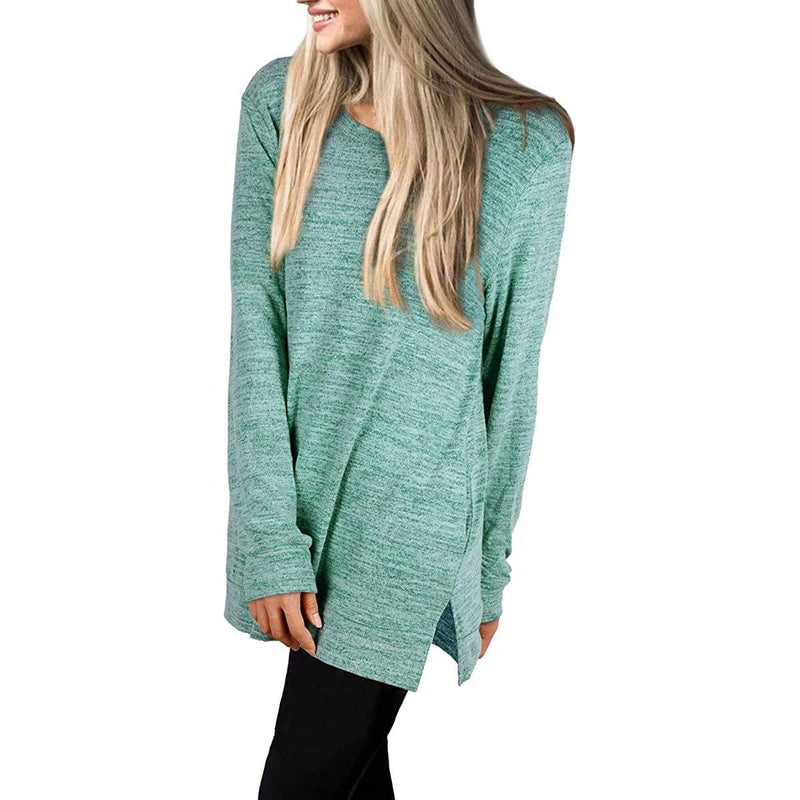 Lateral view of a woman with her hands on her side wearing a Women's Sleeve Oversized Casual Sweatshirts in green