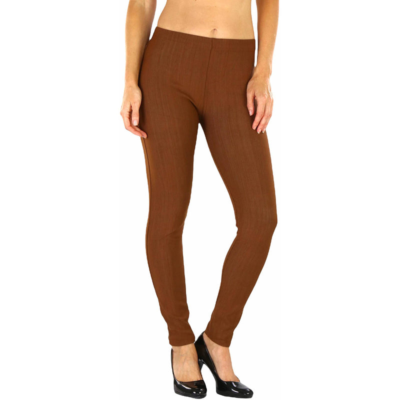 Woman with hands on her side shown below her hips wearing Easy Pull-On Denim Skinny Fit Comfort Stretch Jeggings in brown