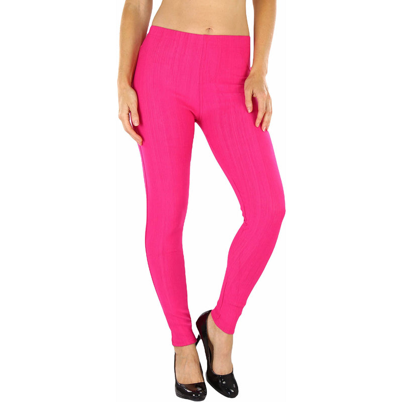 Woman with hands on her side shown below her hips wearing Easy Pull-On Denim Skinny Fit Comfort Stretch Jeggings in hot pink