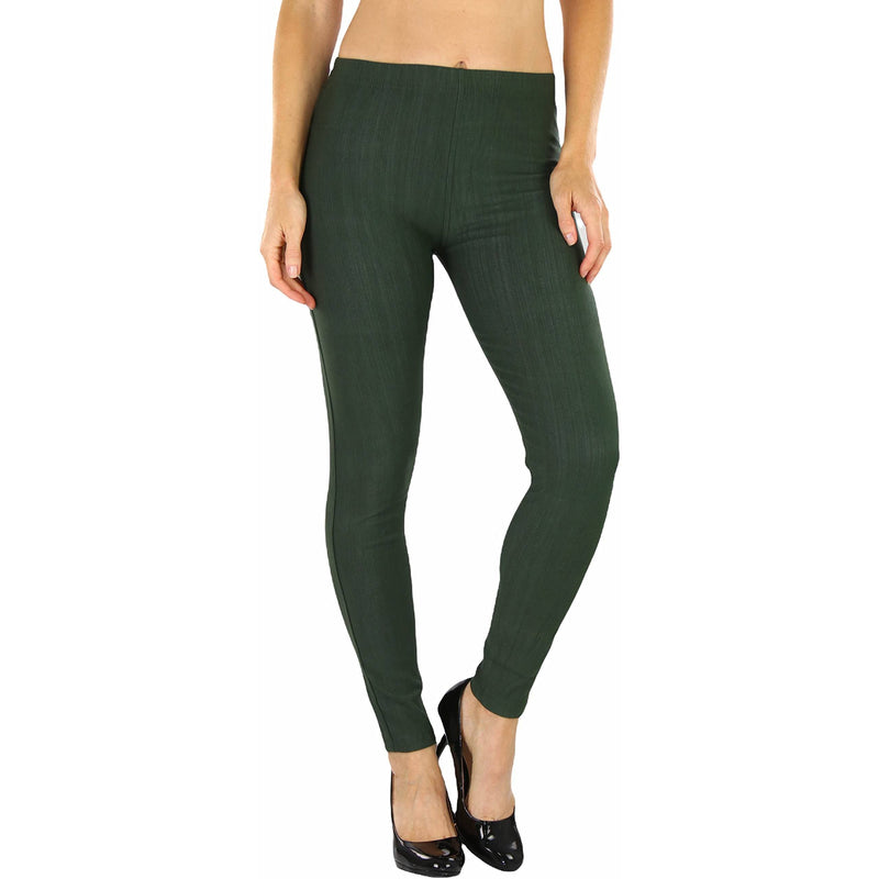 Woman with hands on her side shown below her hips wearing Easy Pull-On Denim Skinny Fit Comfort Stretch Jeggings in forest green