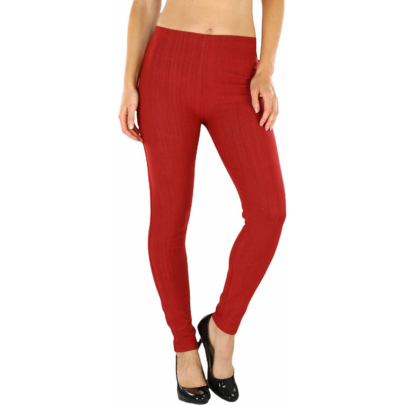 Woman with hands on her side shown below her hips wearing Easy Pull-On Denim Skinny Fit Comfort Stretch Jeggings in maroon
