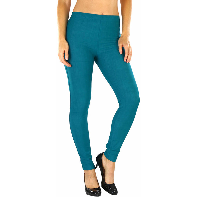 Woman with hands on her side shown below her hips wearing Easy Pull-On Denim Skinny Fit Comfort Stretch Jeggings in spruce