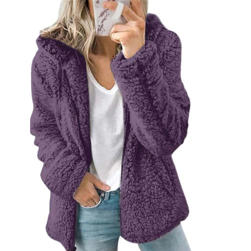 Women holding a smartphone wearing a purple Plus Size Hoodie Coat Long Sleeve, available at Dailysale