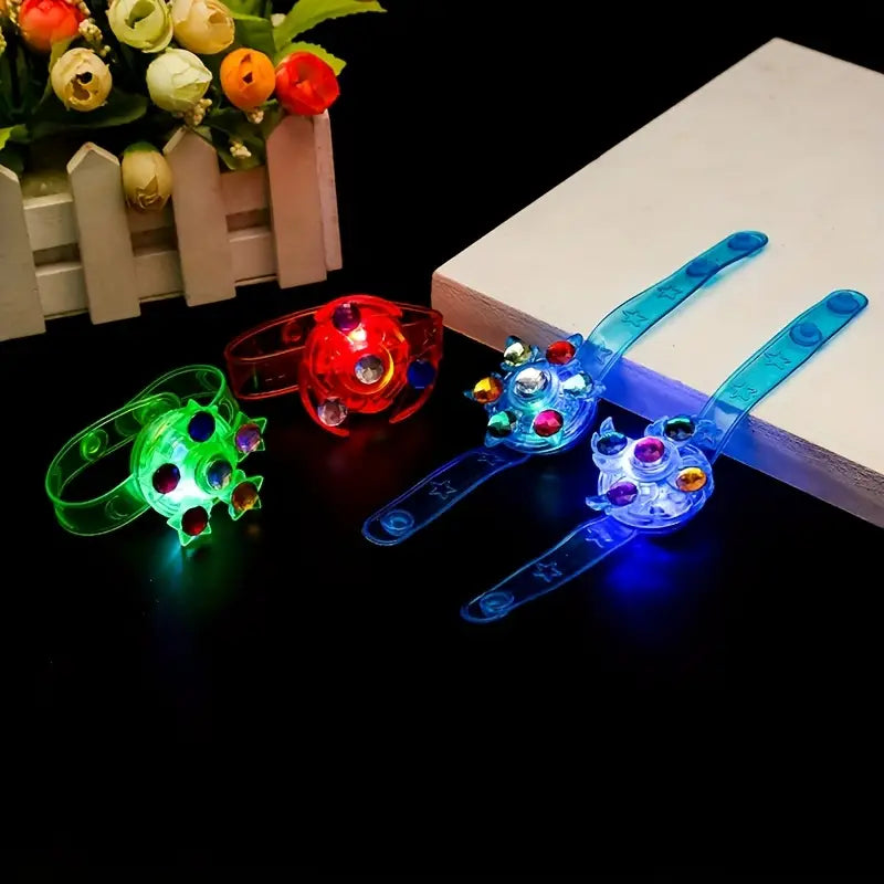 12-Pack: LED Cartoon Spinning Fidget Wristband Toys & Games - DailySale