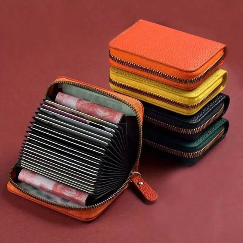 Card wallets stacked, one open showing the accordion card slots