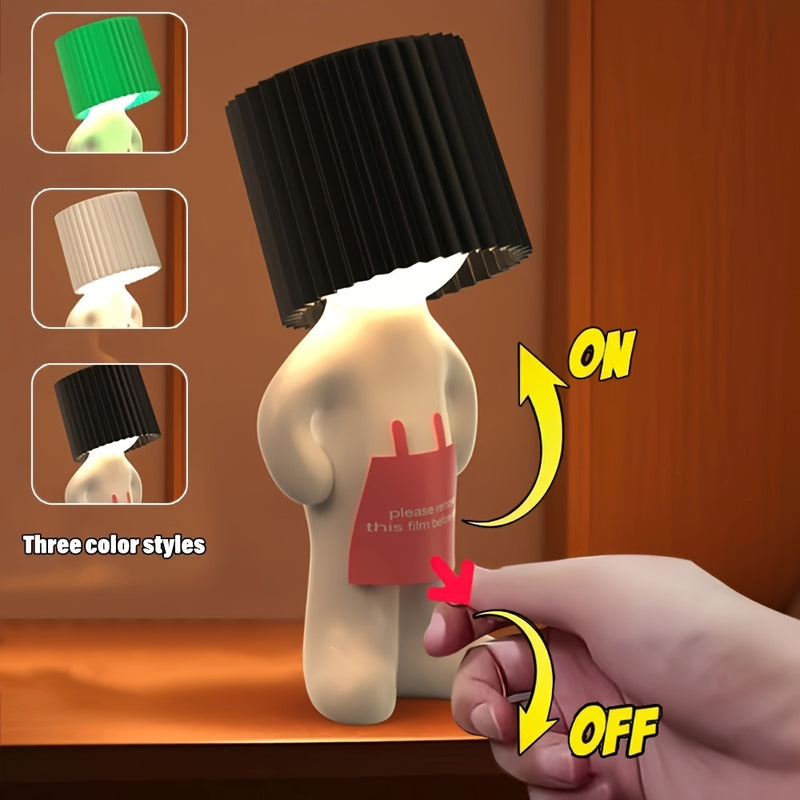 Sliding the shade up and down to switch the lamp on and off