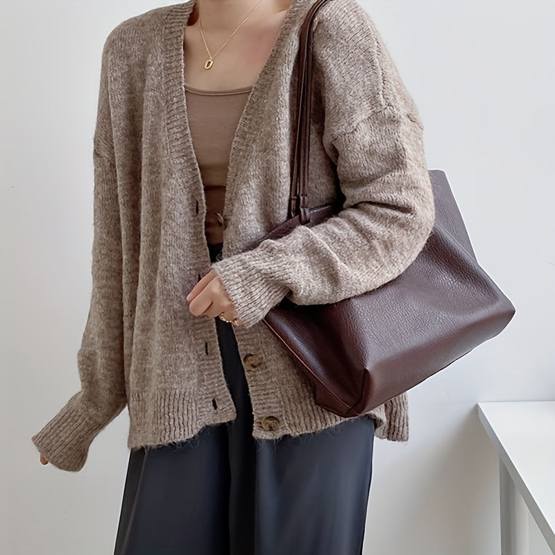 Tote carried under the arm showing the slouch