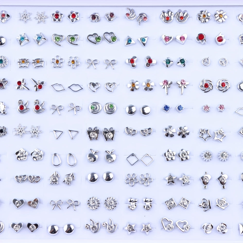 Assorted silver-tone stud earrings: hearts, flowers, stars, bows and rhinestone designs