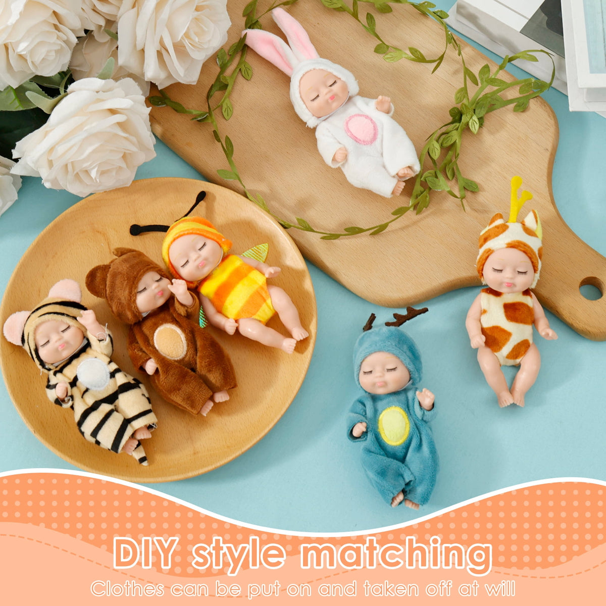 Dolls arranged on a wooden board, outfits can be swapped between dolls