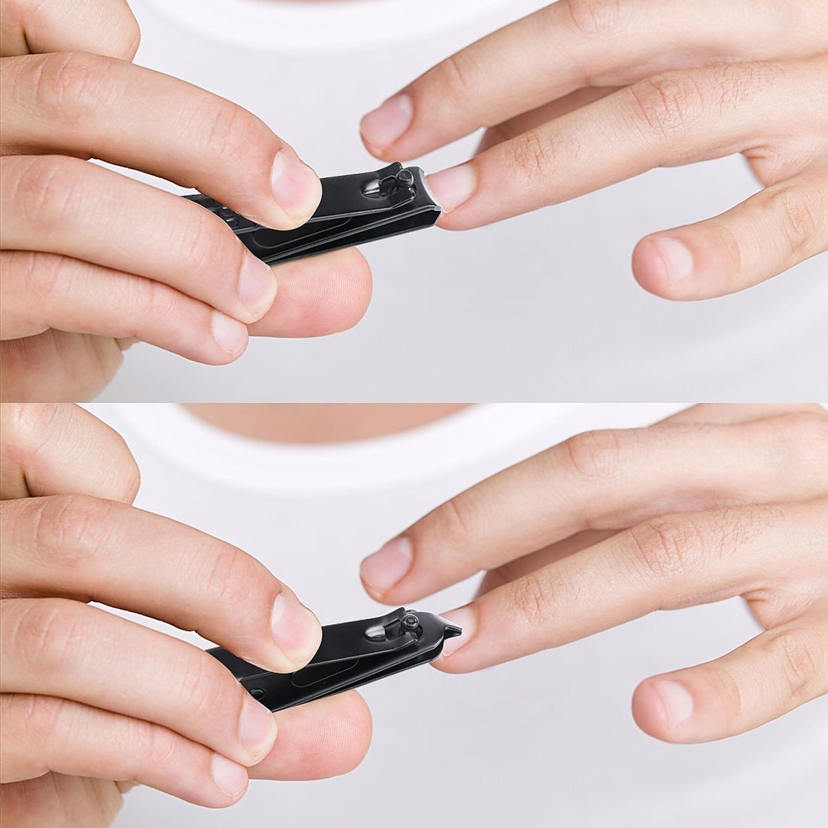 Hands using the black clipper on a fingernail