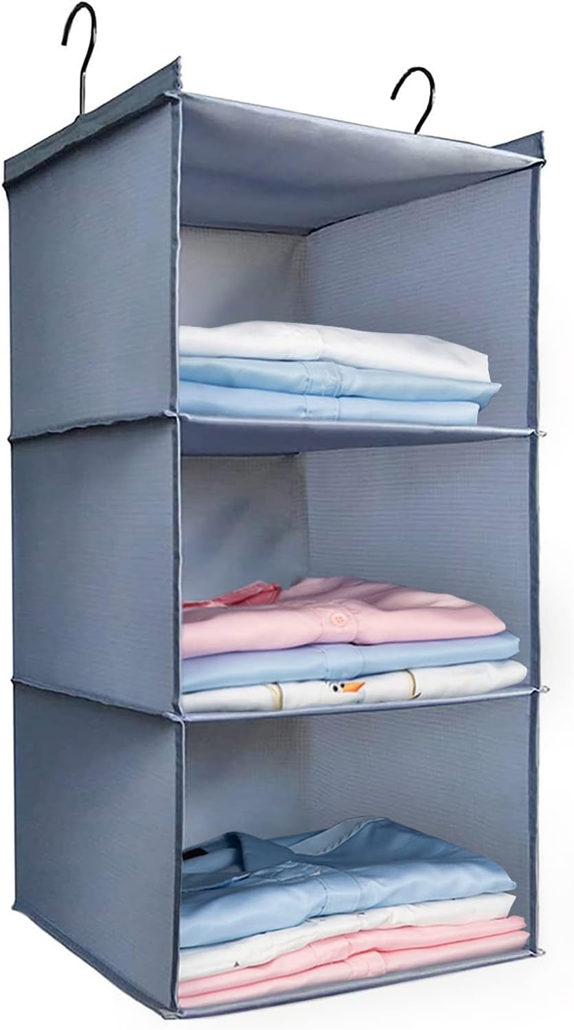 Gray 3-shelf hanging closet organizer holding folded clothes