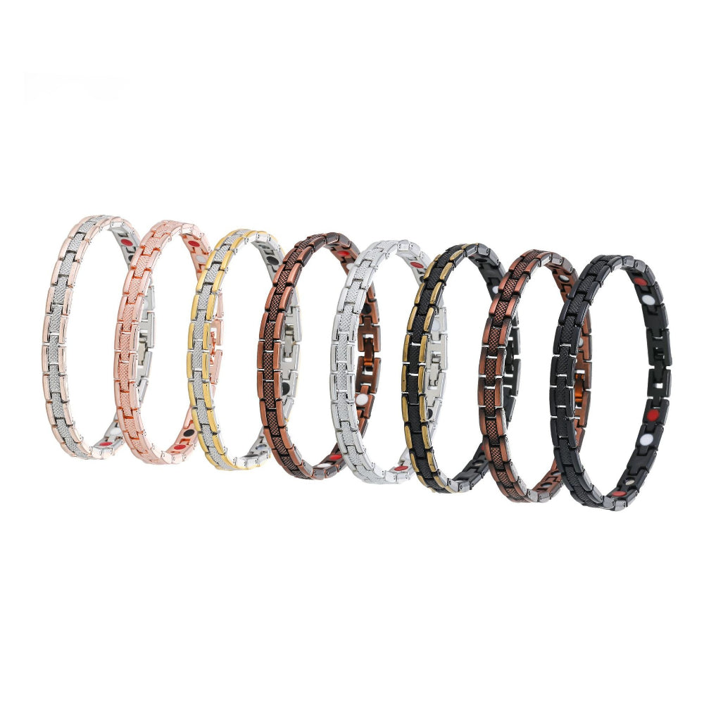 Eight magnetic link bracelets standing side by side in all available finishes