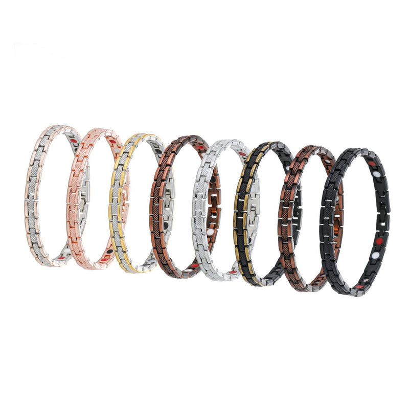 Eight magnetic link bracelets standing side by side in all available finishes