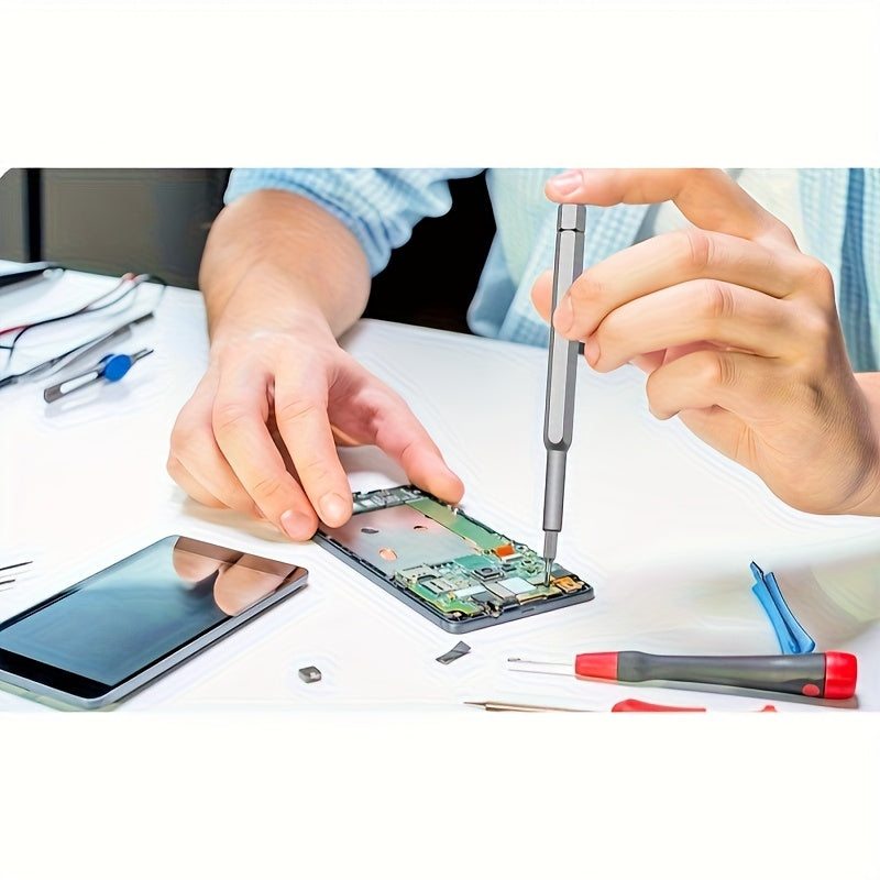 Opening a phone with the screwdriver at a desk