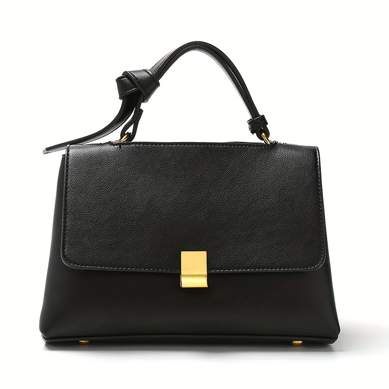 Black top handle flap handbag with gold clasp