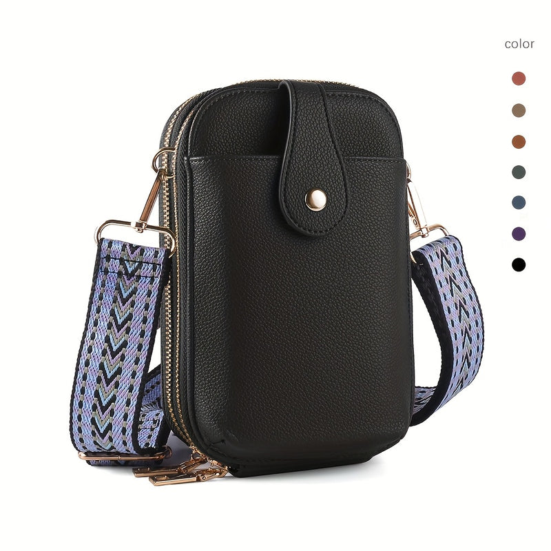 Black phone crossbody bag with wide patterned strap