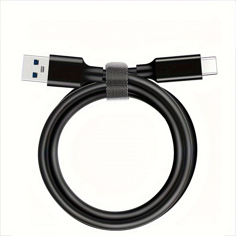 USB-A to USB-C cable coiled with a cable tie