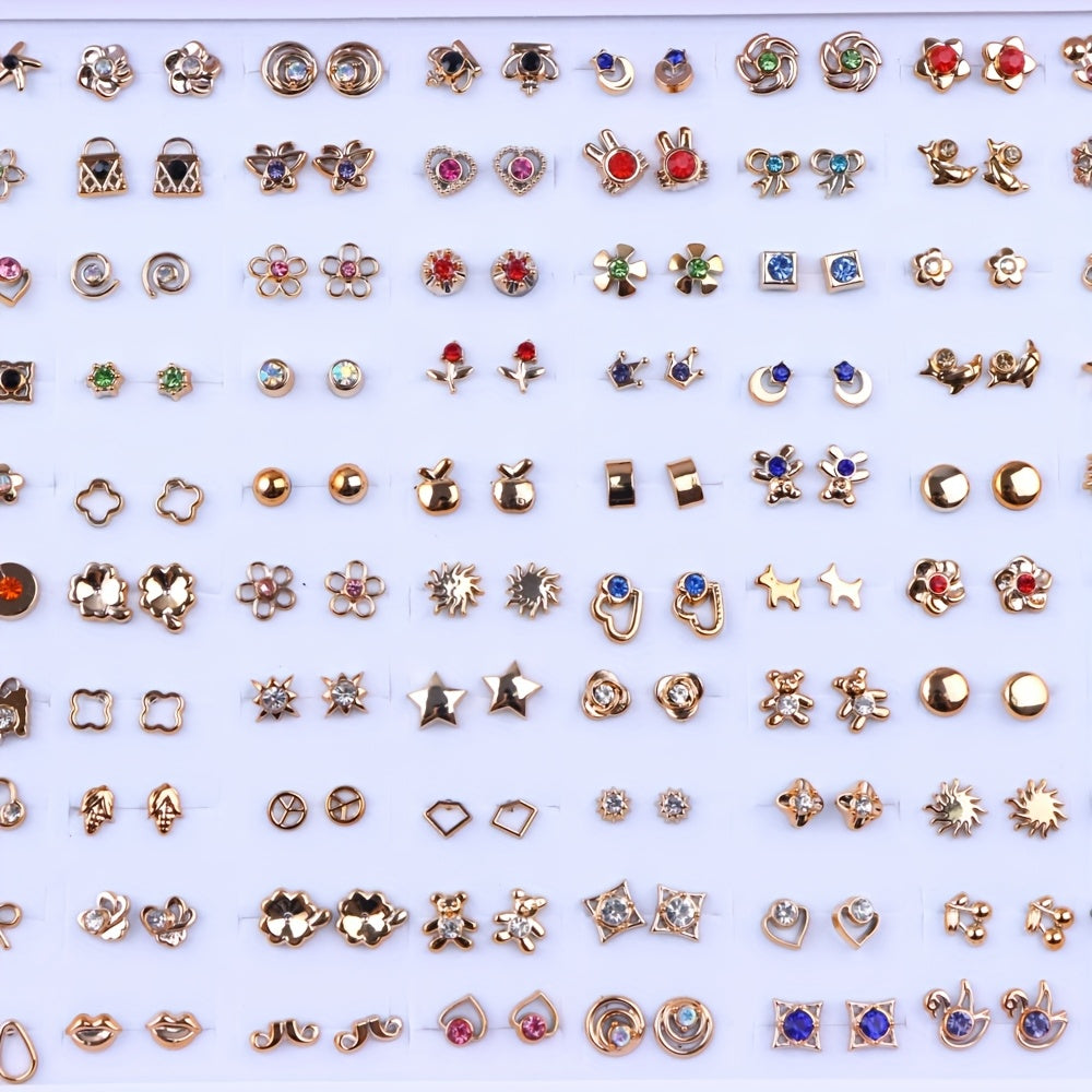 Assorted gold-tone stud earrings: hearts, flowers, stars, bows and rhinestone designs