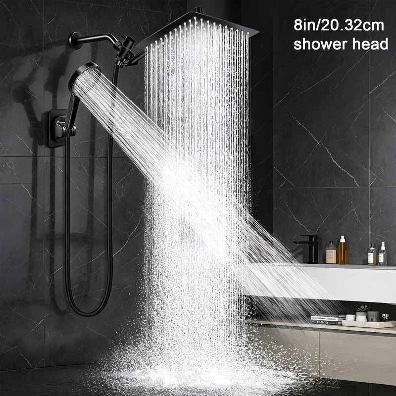 Black rainfall and handheld shower head set in a dark tiled bathroom