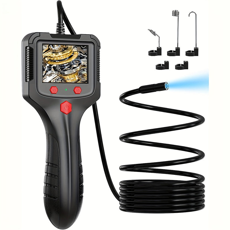 The endoscope with its coiled cable and full set of attachments