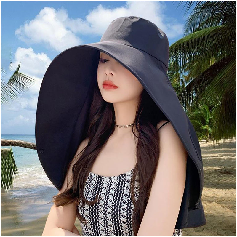 Black sun hat worn at the beach