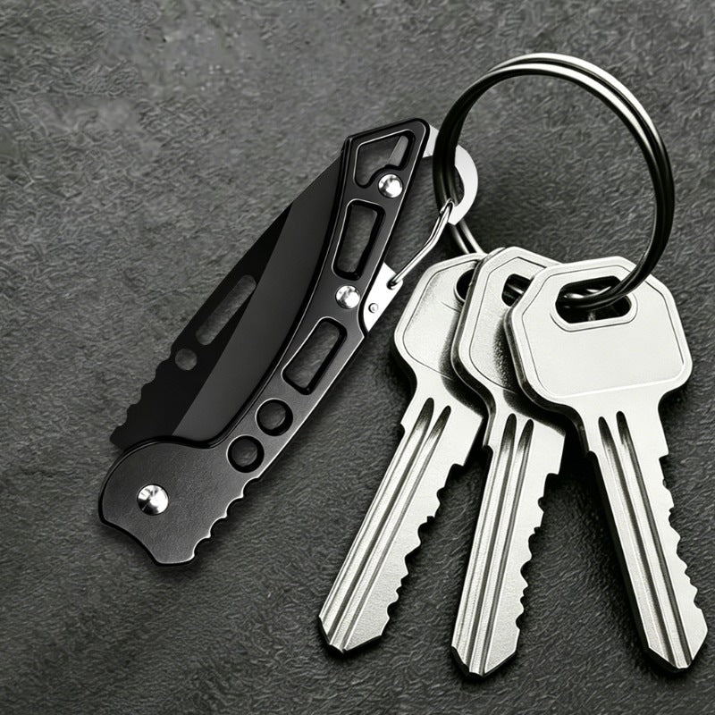 Pocket knife clipped onto a set of keys