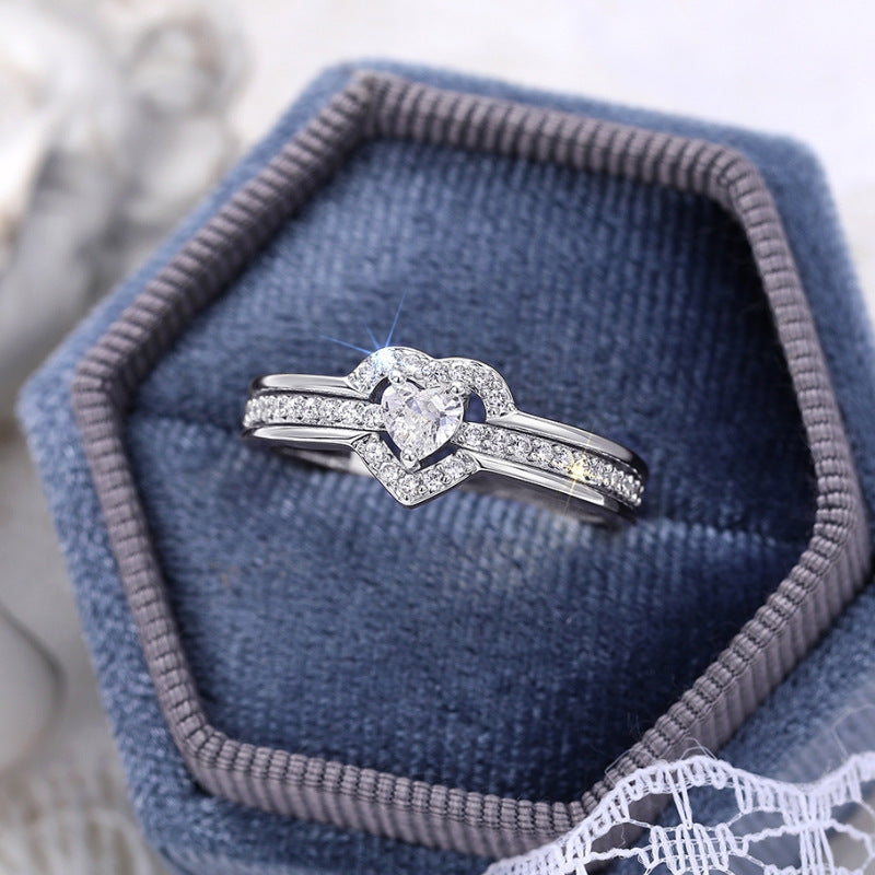 Silver heart ring in a blue velvet gift box