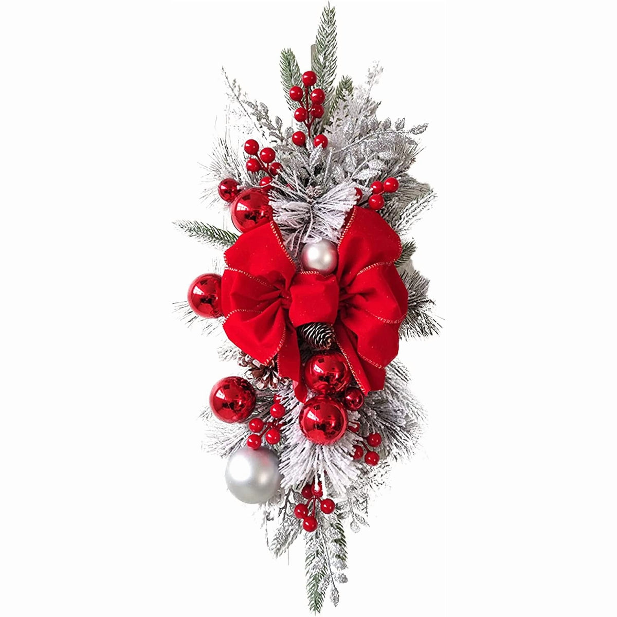 Teardrop Christmas swag with red velvet bow, red and silver ball ornaments, berries and pinecone on flocked greenery