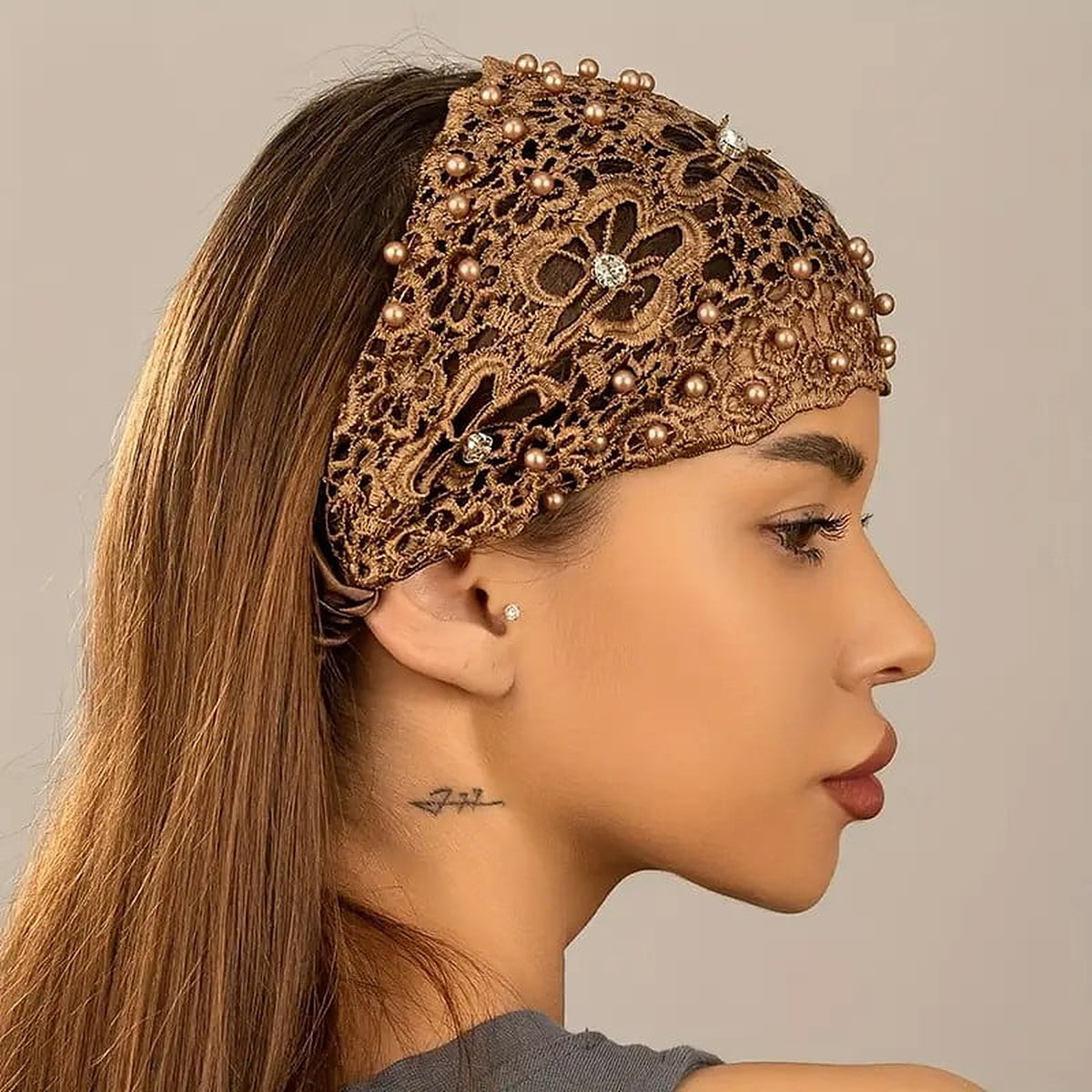 Side view of the brown headband showing how deep it sits over the crown