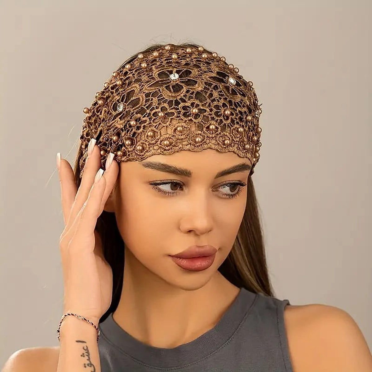 The brown headband worn with hair down, shown from the front