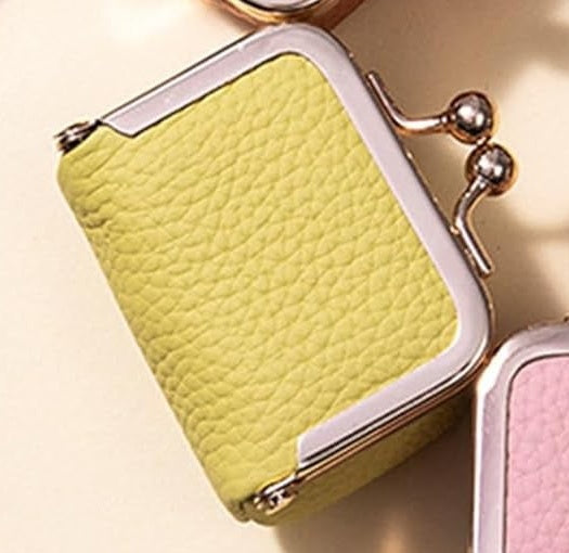 Light yellow mini leather jewelry box with gold kiss lock