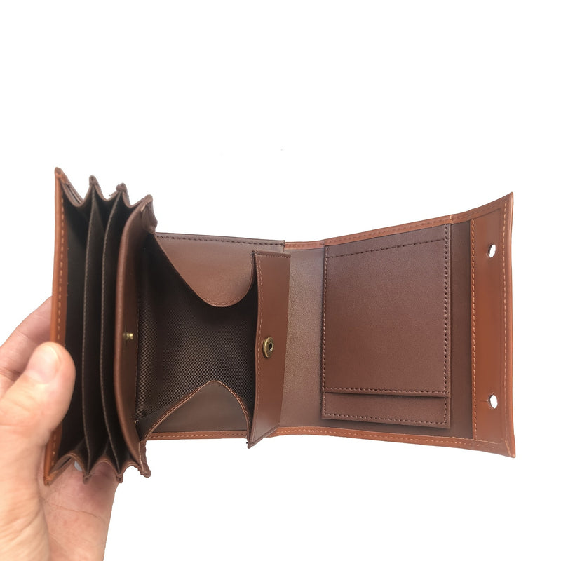 Wallet held open showing the accordion card bellows and snap coin pocket
