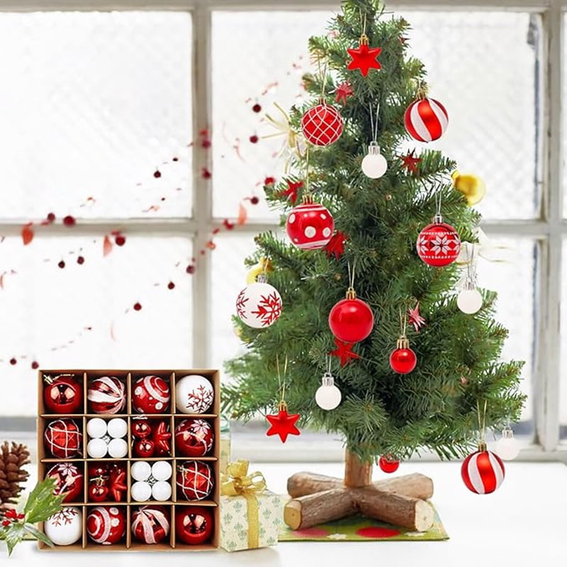Small tabletop tree decorated with the set, tray beside it