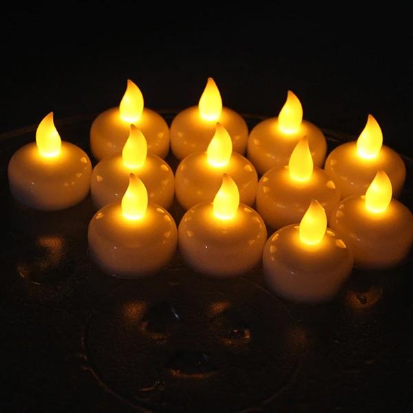12-Pack: LED Floating Tea Waterproof Flameless Candle Lighting & Decor - DailySale