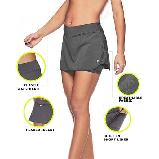 Woman wearing Penn Women's Active Athletic Performance Skorts in gray shown with key features