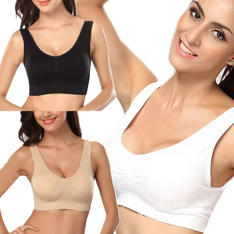 Three models wearing a black, white, and beige bra from the 3-Pack: Seamless Miracle Bras with Removable Pads - Assorted Color Sets