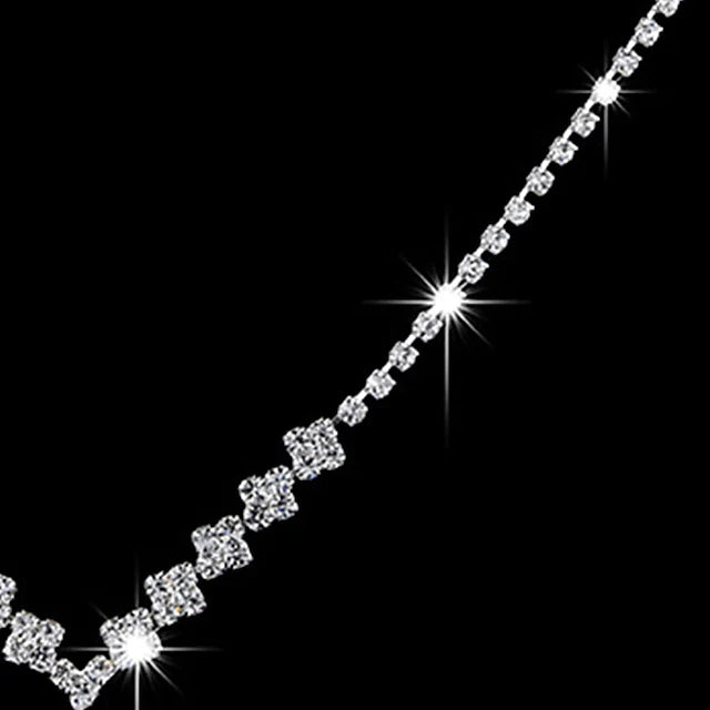 Women's Diamond Necklace close up on black background