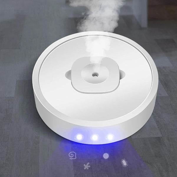 4-in-1 Movable Air Purifier Humidifier Ultraviolet Cleaner Aroma Diffuser shown in operating on a ceramic floor