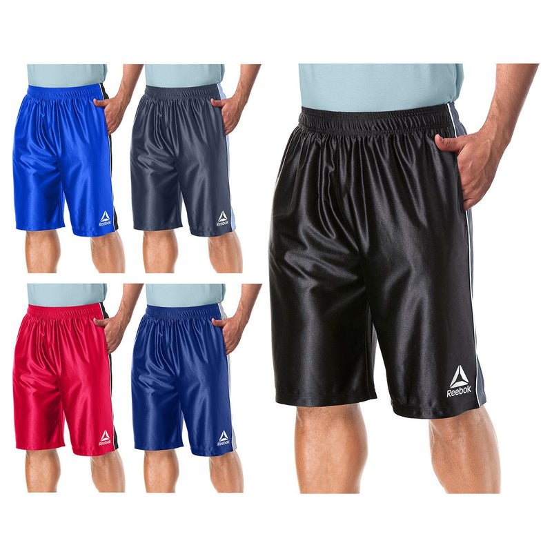 Man with one hand in his pocket modelling each of the four available colors in the Reebok Men's Two Toned Athletic Performance Dazzle Shorts With Pockets 4-Pack