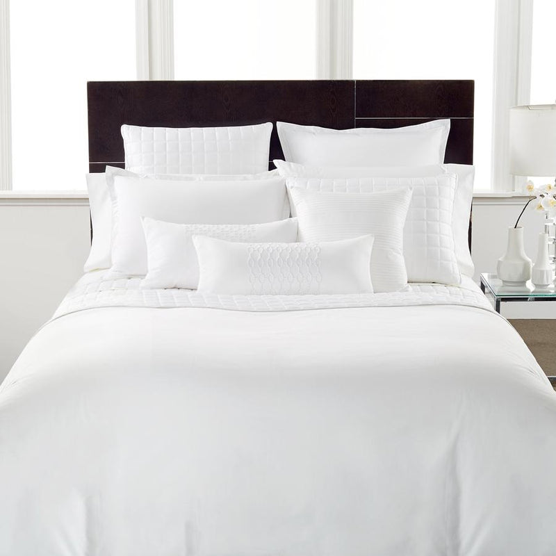 Top-front view of a 6-Piece Set of Egyptian Comfort 1600 Count Deep Pocket Bed Sheets laid out on a queen-size bed