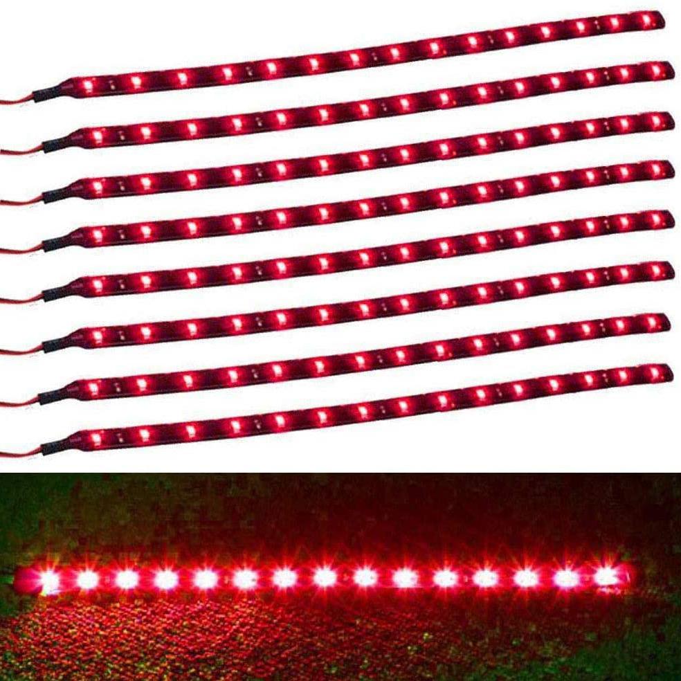 8-Piece Flexible Waterproof red LED Strip Light for Car laid out on a white surface