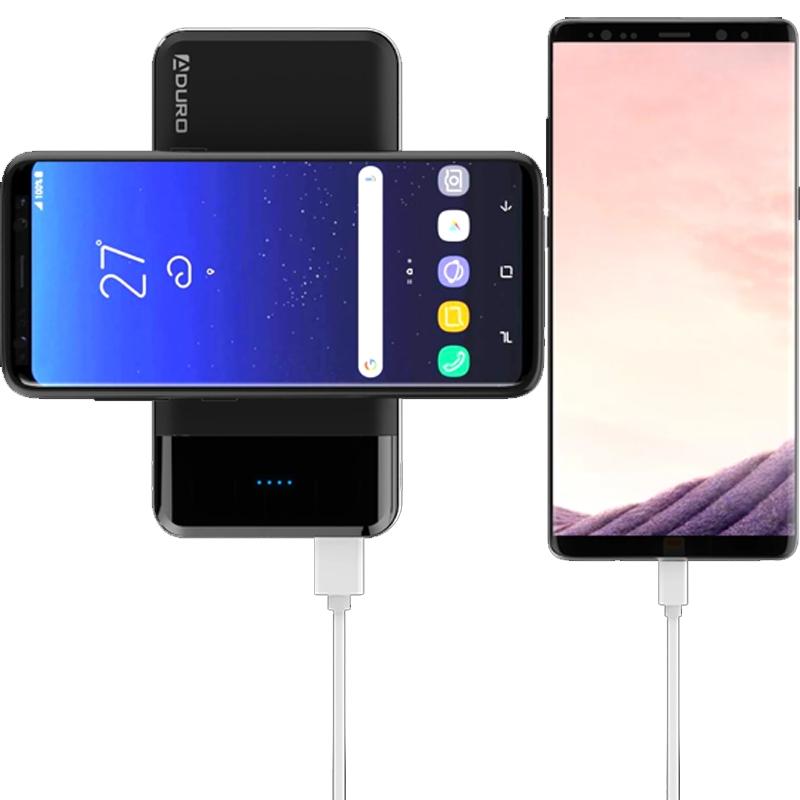Smartphones shown charging using an Aduro PowerUp Wireless Charging 10,000mAh Dual-USB Backup Battery