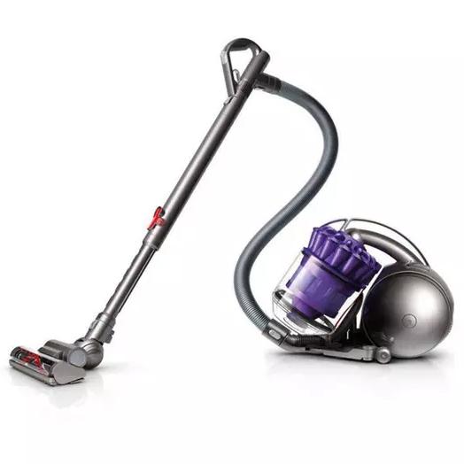 Purple Dyson DC39 Animal Canister Vacuum Cleaner (Refurbished) on display standing on a floor surface in "vacuum" position
