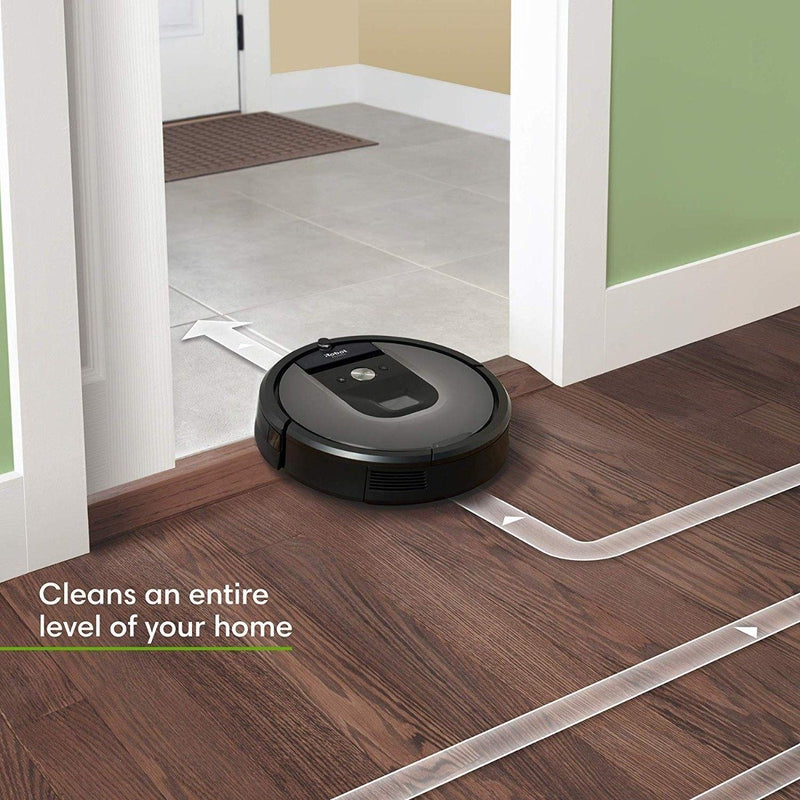 iRobot Roomba 960 Robot Vacuum in action shown entering a room as it vacuums the floors