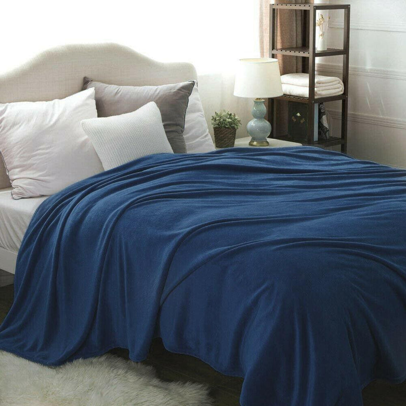 Kathy Ireland Flannel Solid Microplush Bed Blankets