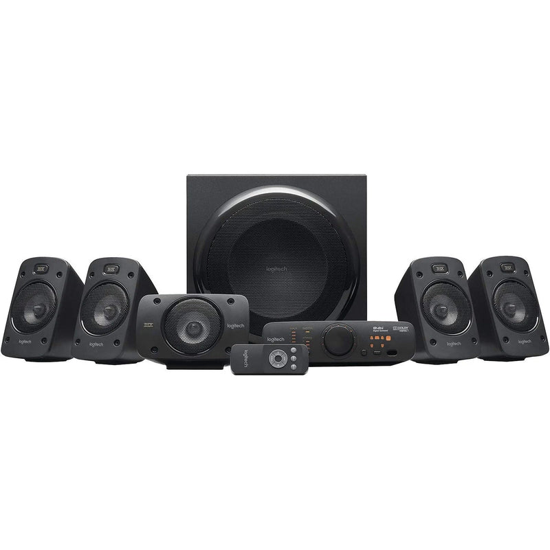 Full Logitech Z906 5.1 Surround Sound Speaker System - THX, Dolby Digital and DTS Digital Certified - spread out over a surface, showcasing each component