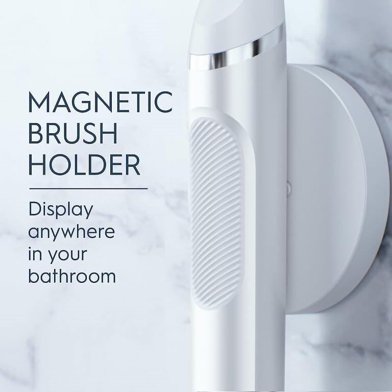 Magnetic brush holder for the Oral-B Clic Manual Toothbrush attached to the bathroom wall